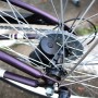 Alimentation à piles fixée dans le moyeu de roue